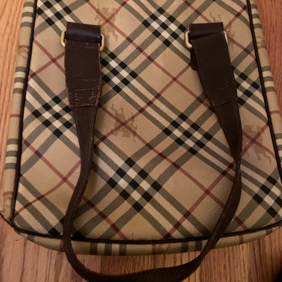 Burberry purse with browns leather straps and snap front with opening - Picture 10 of 13